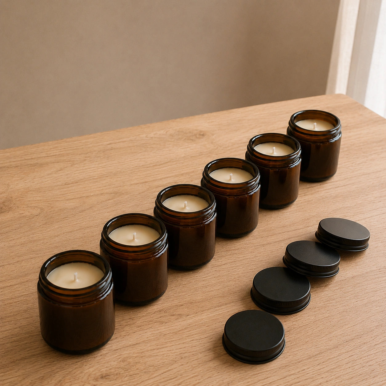 Choco Crave scented soy candles in dark glass jars with black lids on wooden table during candle making process