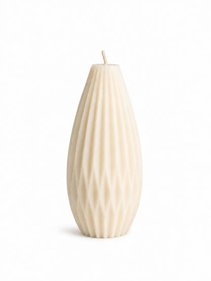 An off-white textured teardrop-shaped candle with a ribbed, pleated surface and a single wick, shown on a clean white background.